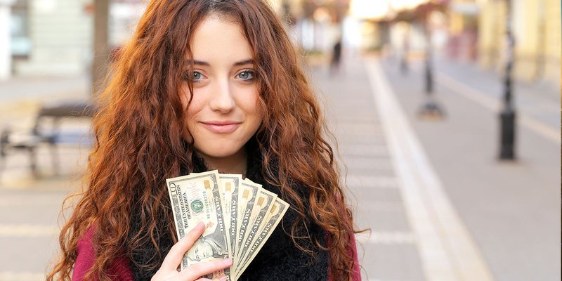 USA-dollars-girl-curly-cash-HEADER-shutterst.max-800x600