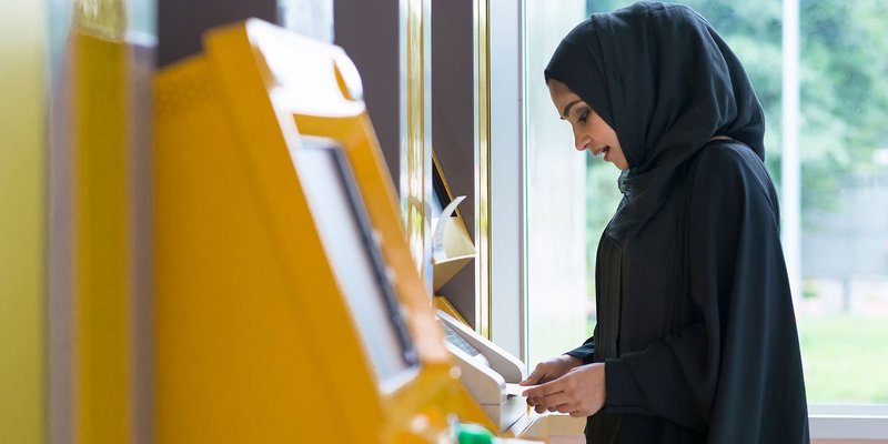 Woman-burqa-atm-HEADER-shutterstock_1172919838.original